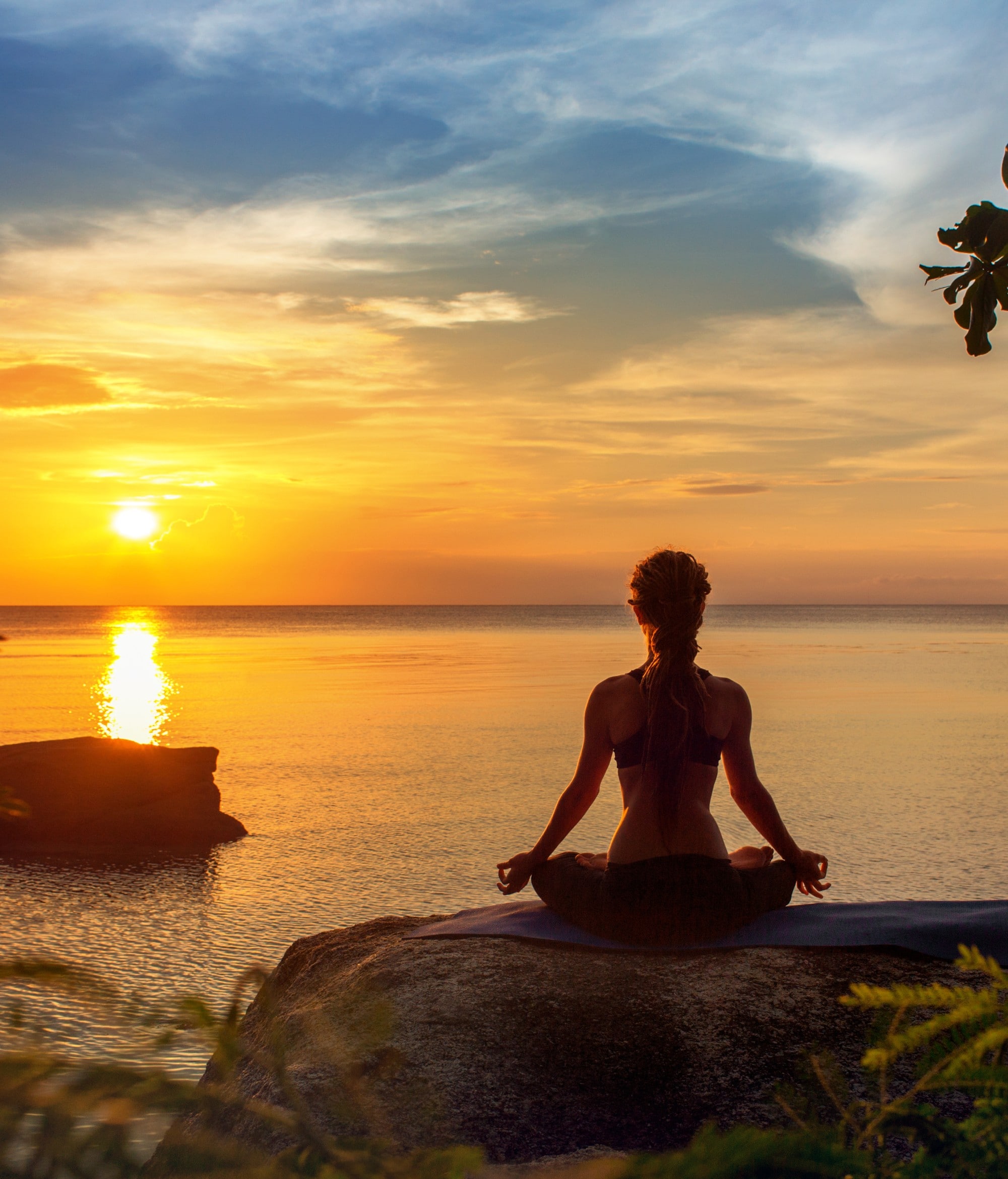 Woman Doing Meditation On Sunrise