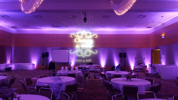 DECC, Horizon Room.
Wedding lighting in purple with wedding monogram.