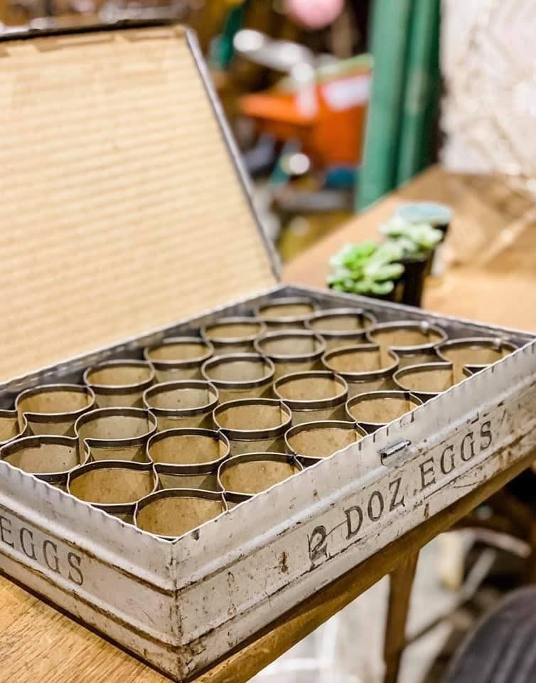 Cool metal antique egg crate is just one of many possible flea market finds at The Modern Vintage Market