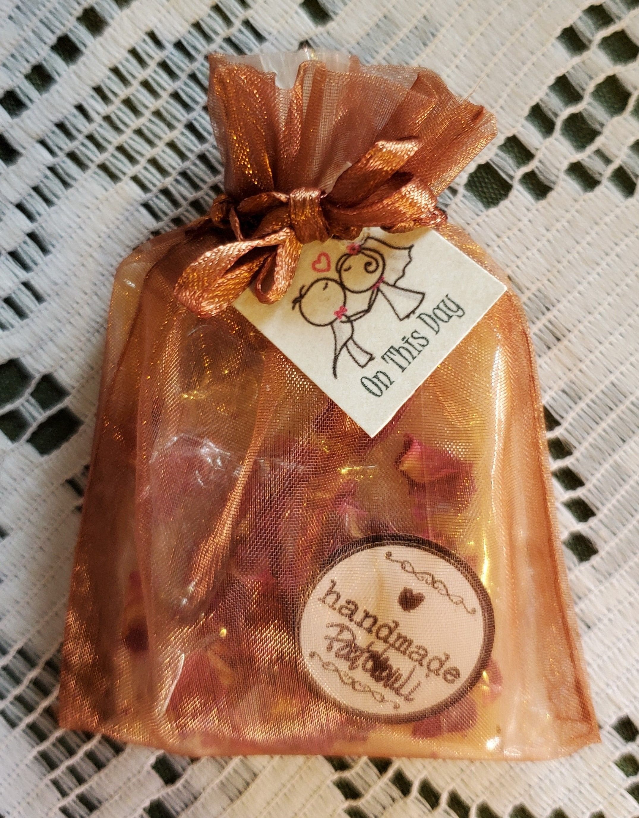 We make lovely soap gifts.  They are inexpensive, attractive, unique and handmade;  great quality ingredients, an item that you will be pleased to gift.