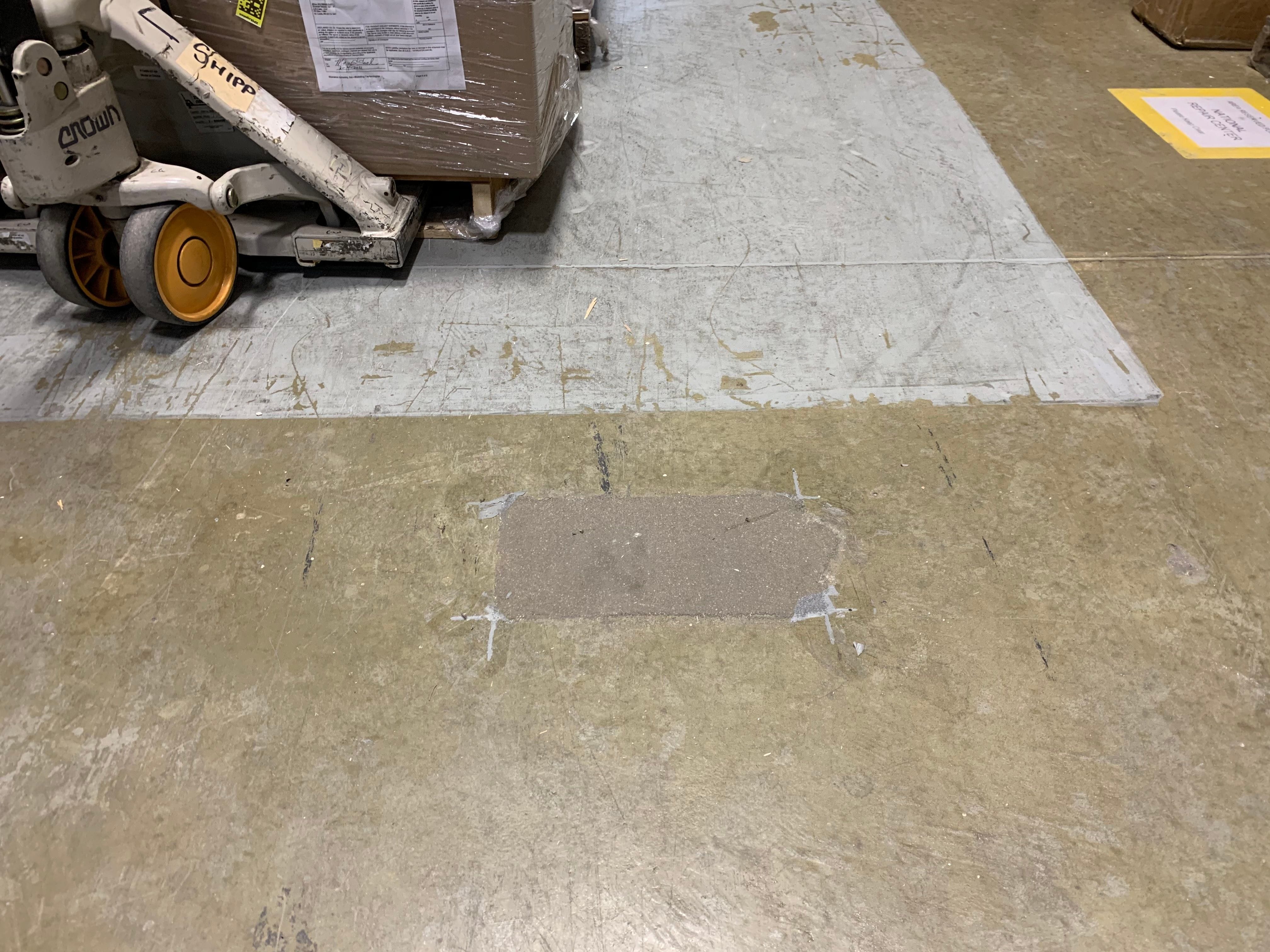 broken out concrete repaired with patch material