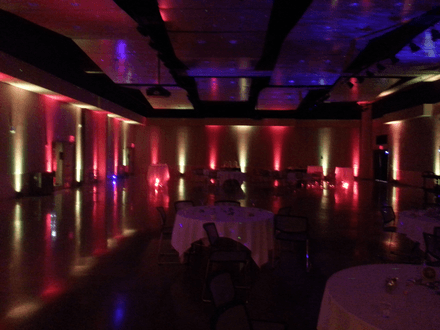 Red and white wedding lighting with stars on the ceiling. UWS
