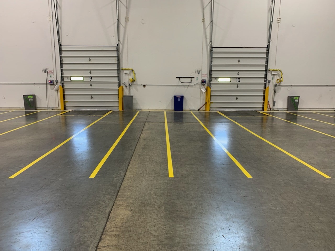 dock doors with line striping in warehouse