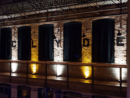 Wedding lighting at the Clyde. Up lighting in gold and white.