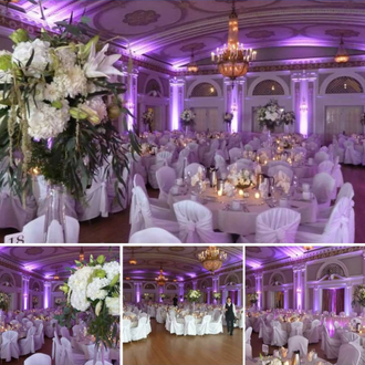 Up lighting in lavender pink at Greysolon Ballroom for a wedding.