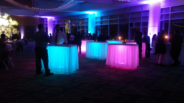 Pink and blue wedding lighting at the DECC. Harbor Side Ballroom. Glowing cocktail tables.