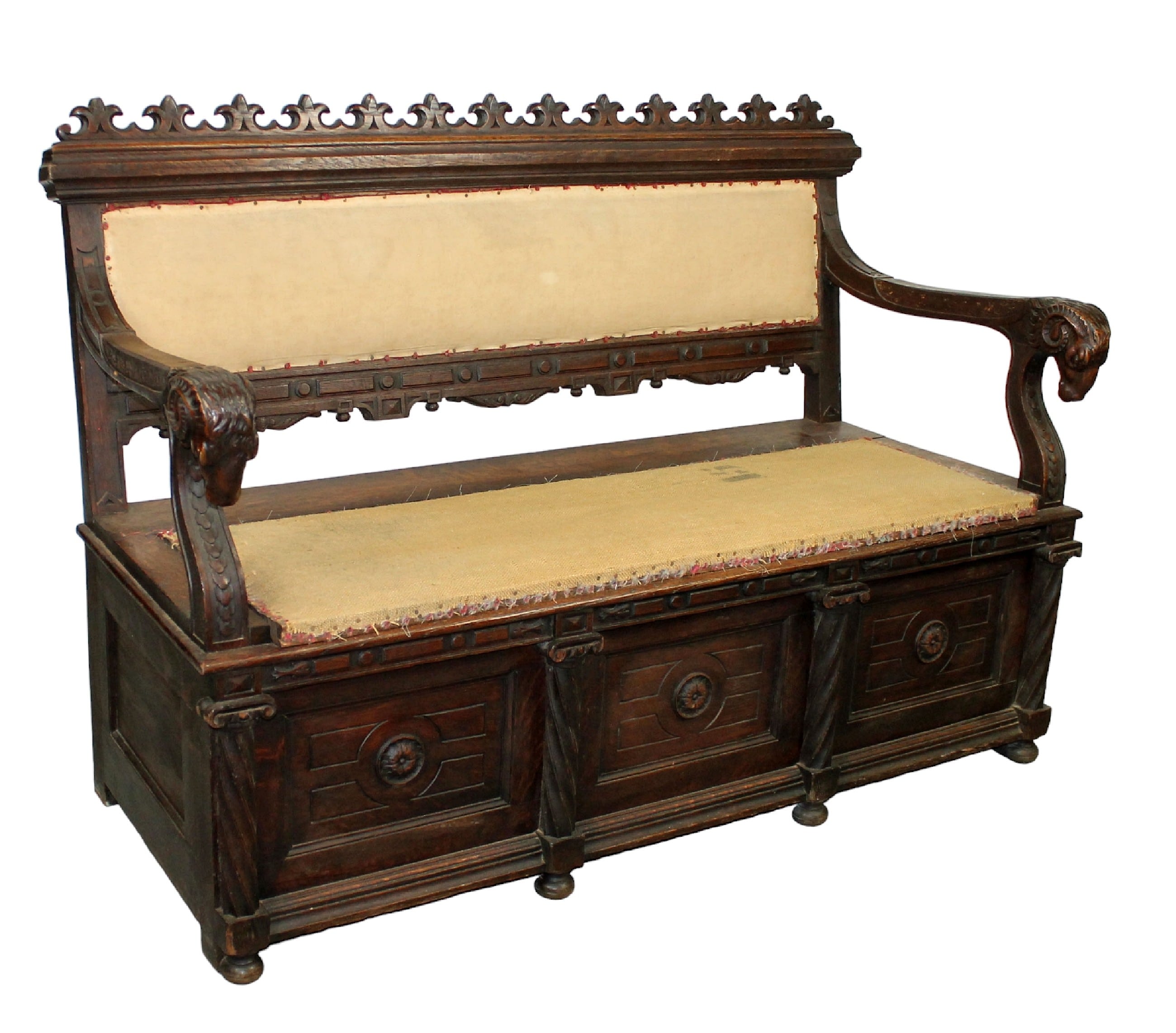 French carved oak hall bench with rams heads