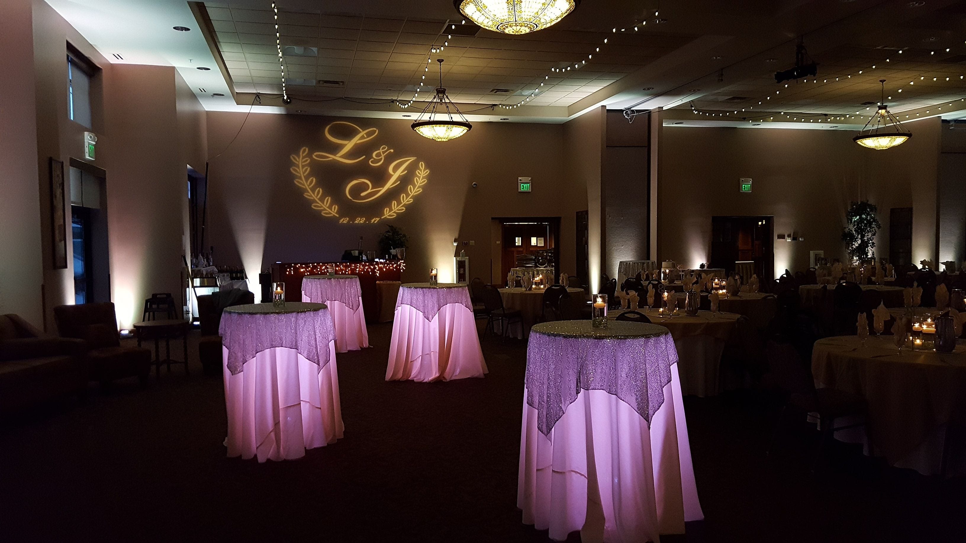 Wedding lighting at the Timberlake Lodge in Grand Rapids, MN. Up lighting in champagne white.