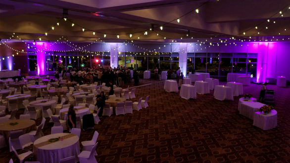 DECC Harbor Side Ballroom.
Wedding lighting in lavender with bistro.
