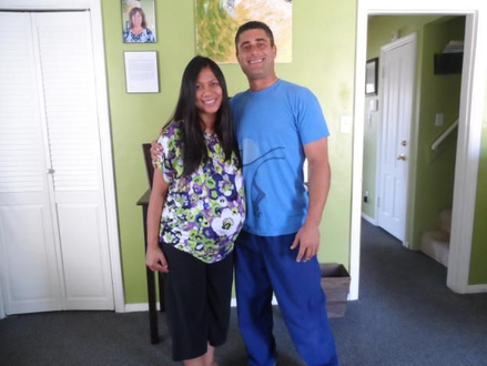 Dr. Biscotti of South Bay Family Chiropractic is performing chiropractic care for pregananant client in this photo.