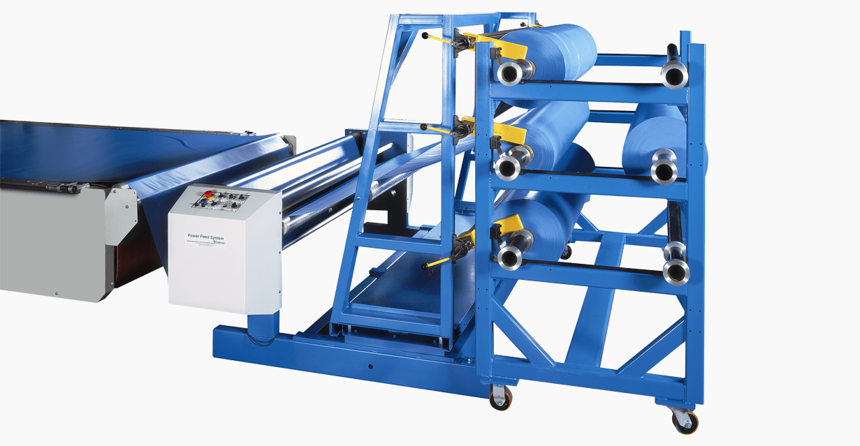 EASTMAN Power Feed, Roll Stand Interface
The Power Feed Syste
The Power Feed System simplifies material feeding to the cutting system by automatically adjusting