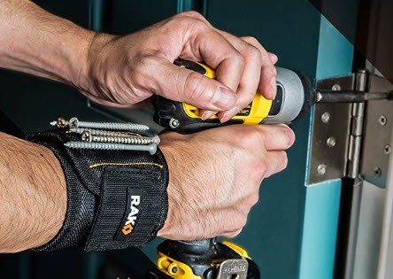 RAK Magnetic Wristband on someone's arm with nails attached to the magnetic