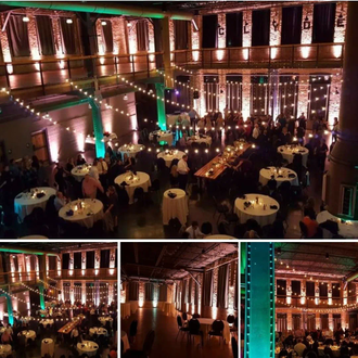 Wedding lighting with peach and mint green up lighting at the Clyde.