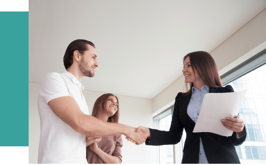 Couple Shaking Hands With Agent
