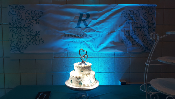 Duluth Armory wedding lighting. A pinspot on the wedding cake.