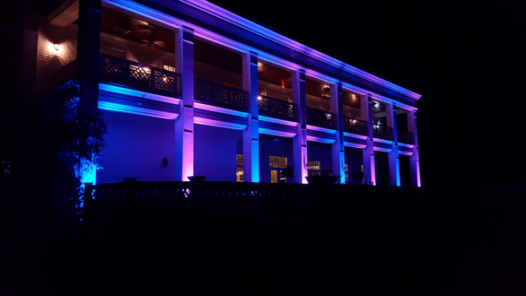 Northland Country Club with blue and purple outdoor lighting.