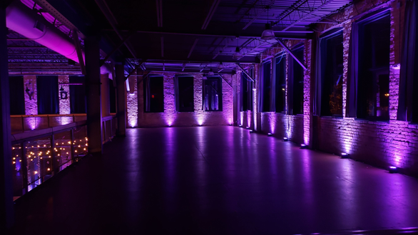 Wedding lighting in two tone lavender at Clyde Iron Works.