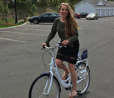 Bike share rider in skirt