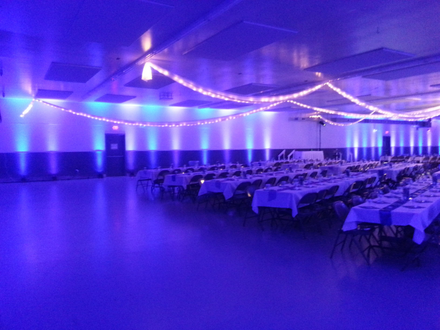 Wedding lighting at the Superior Curling Club. Up lighting in blue and white