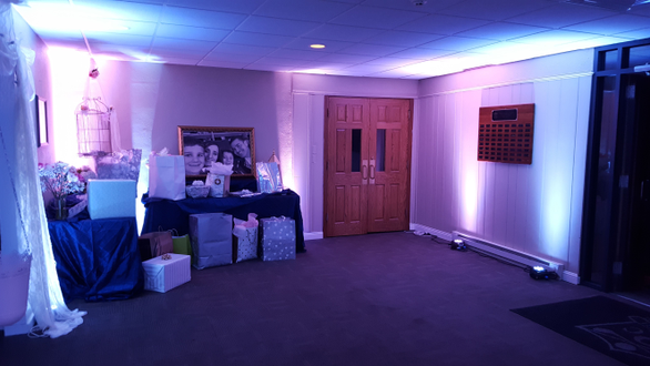 Wedding at Ridgeview Country Club. Up lighting in blue and lavender pink.