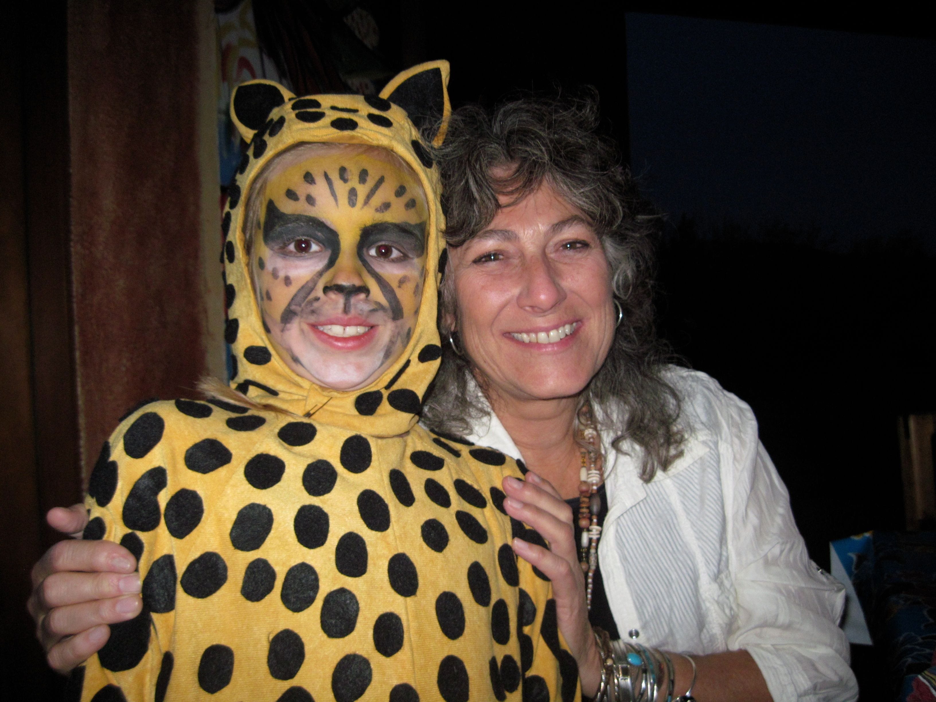 Dress up like a cheetah! Lots of spots with a long tail and painted face. Dr. Laurie Marker and Cheetah Kid Kristen.