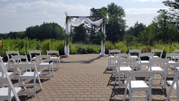 Northland Country Club wedding. Ceremony on the patio with garden bistro