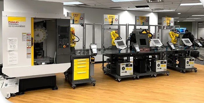 VANGUARD VISION a FANUC ROBOTICS 
AUTHORIZED INTEGRATOR 
 and ROBOTICS TRAINING CENTERINDUSTRIES SERVED, 
COMMERCIAL SERVICES, 
and ORGANIZATIONS