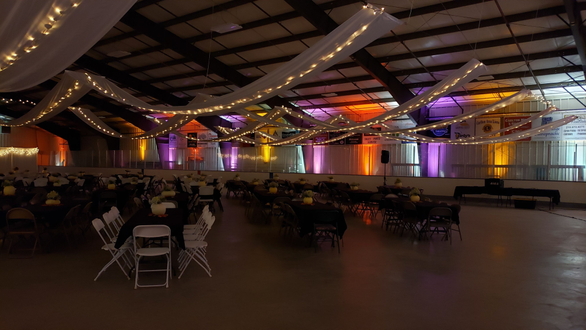 Carlton Four Seasons sports complex. Wedding lighting with a fall color theme.