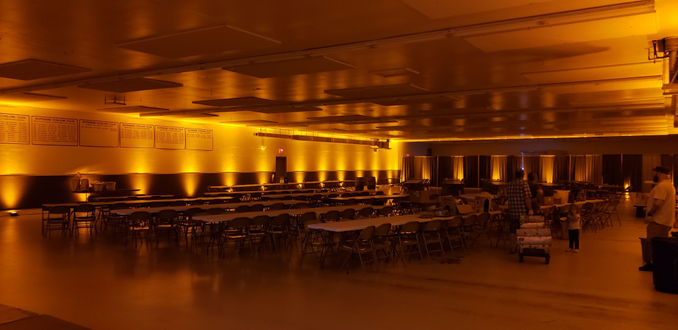 Wedding lighting at the Superior Curling Club. Up lighting in amber.