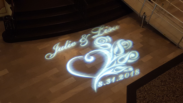 Moorish Room wedding lighting. Custom wedding monogram by the steps to the room.