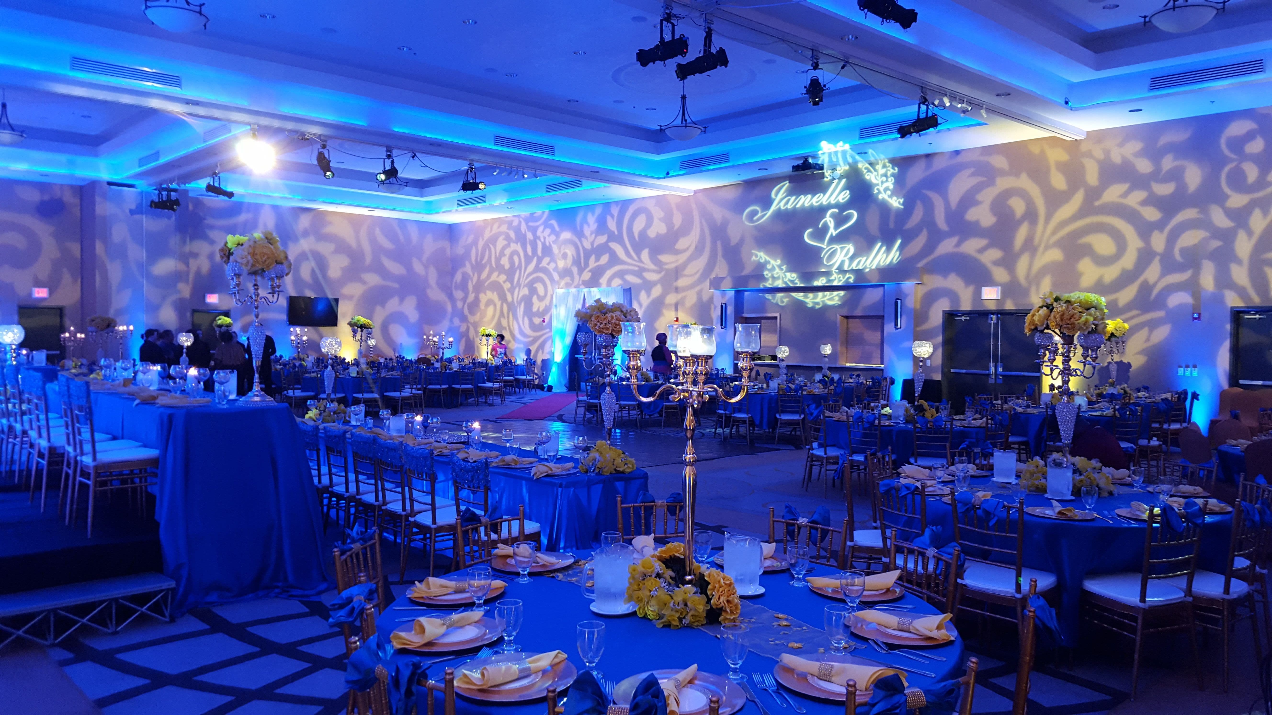 Hilton Doubletree in Fargo, ND. Wedding lighting in blue and yellow with fancy gobo patterns on the walls.