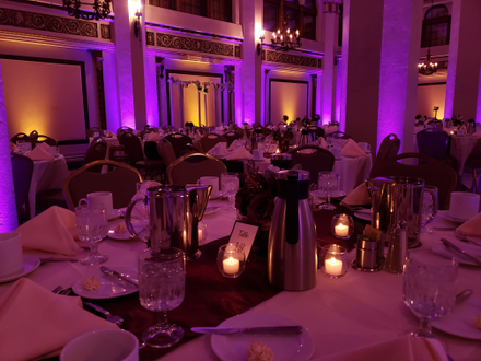 Wedding lighting in the Moorish Room. Up lighting in purple and gold.