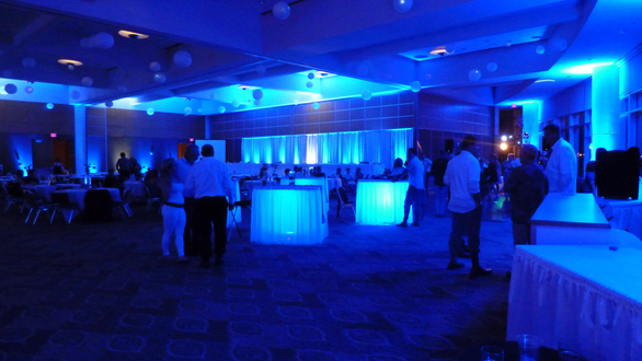 DECC, Harbor Side Ballroom wedding. Up lighting in blue and white. Glowing cocktail tables.