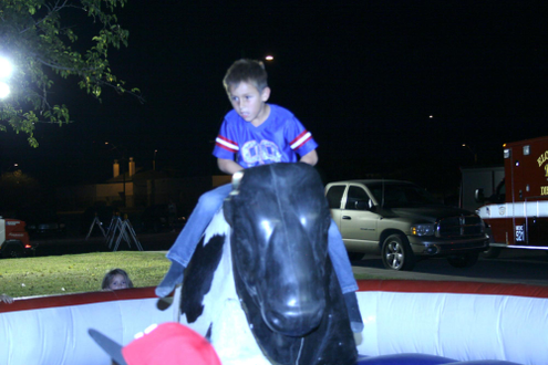 Kid On Bull Riding Toy
