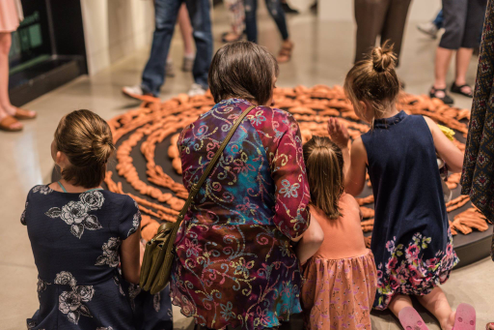 Visitors enjoy the work of Whitney Forsyth during the 2019 exhibition State of Craft at 108 Contemporary