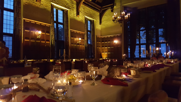 The Great Hall at the Kitchi Gammi Club. Up lighting in yellow.