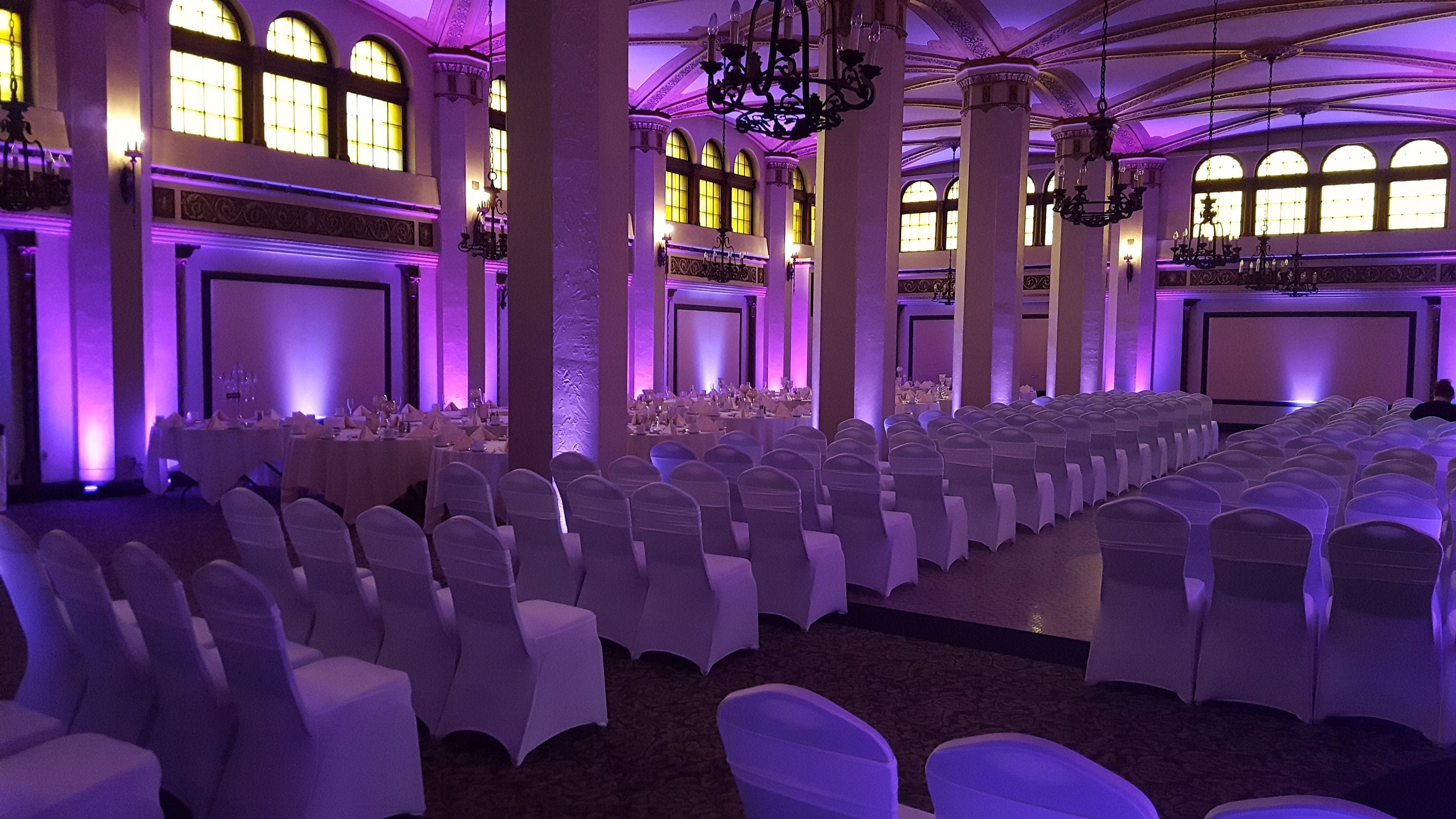 Wedding lighting in the Moorish Room at Greysolon Plaza. Up lighting in two tone lavender.