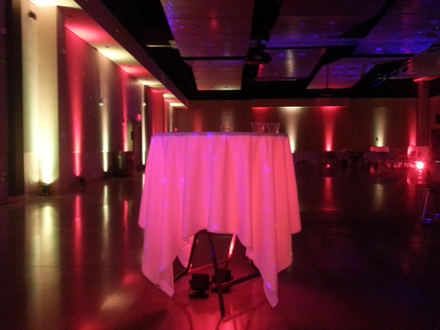 Yellowjacket Union at UWS. Wedding lighting in red and white with glowing cocktail tables.