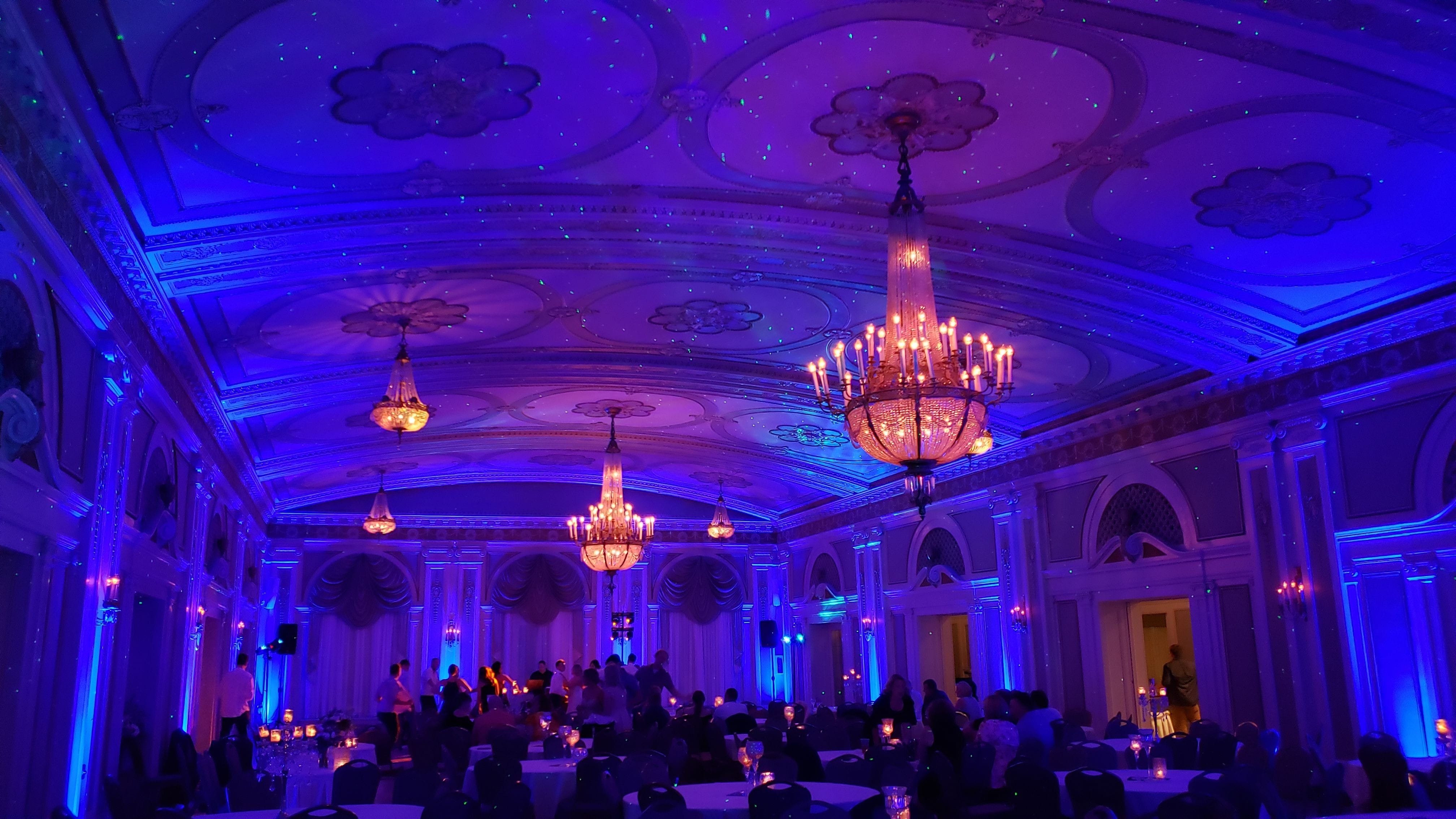 Wedding lighting at Greysolon Ballroom. Up lighting in blue with stars and Northern Lights.