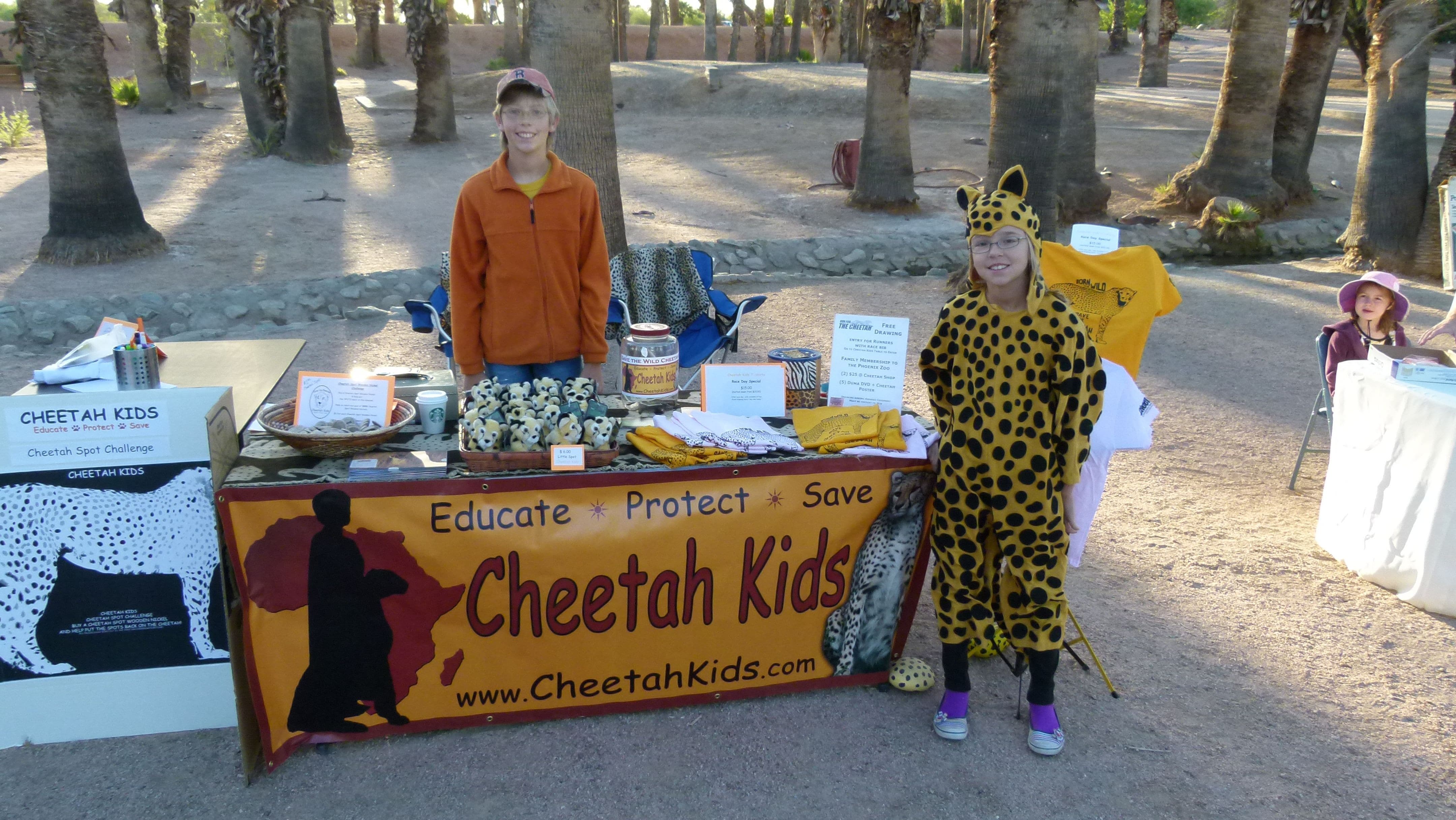 Cheetah Kids sell merchandise to raise funds for wild cheetahs.