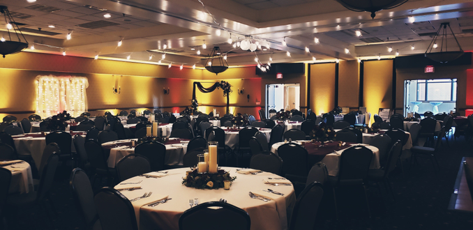 Inn on Lake Superior.
Wedding lighting in gold and a dim red with bistro on the ceiling.