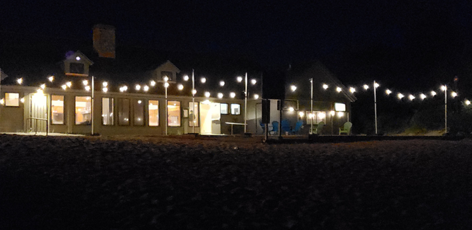 Park Point Beach House wedding lighting with bistro on the back patio by Duluth Event Lighting