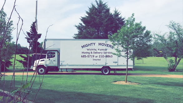An employee at Mighty Movers Moving and Delivery Service
