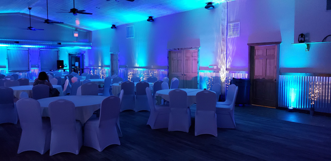 Wedding lighting at the Buffalo House. Up lighting in two tone blue with water lights.
