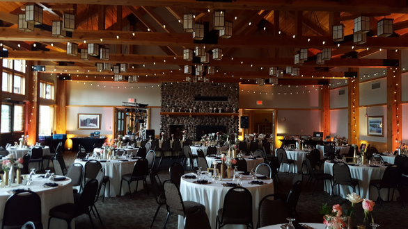 Wedding lighting in the lodge dining room at the Heartwood Event Center in Trego.