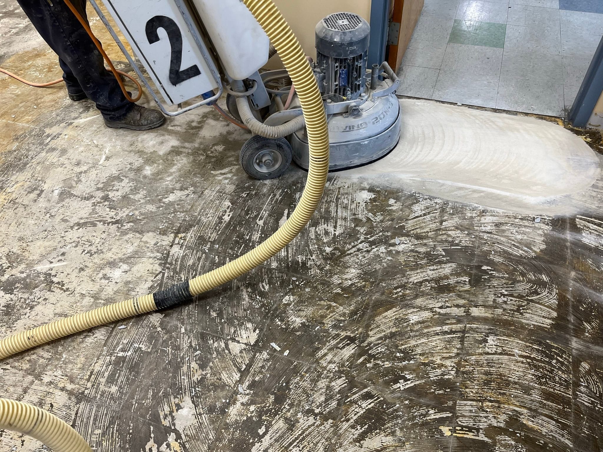 grinding off mastic on floor