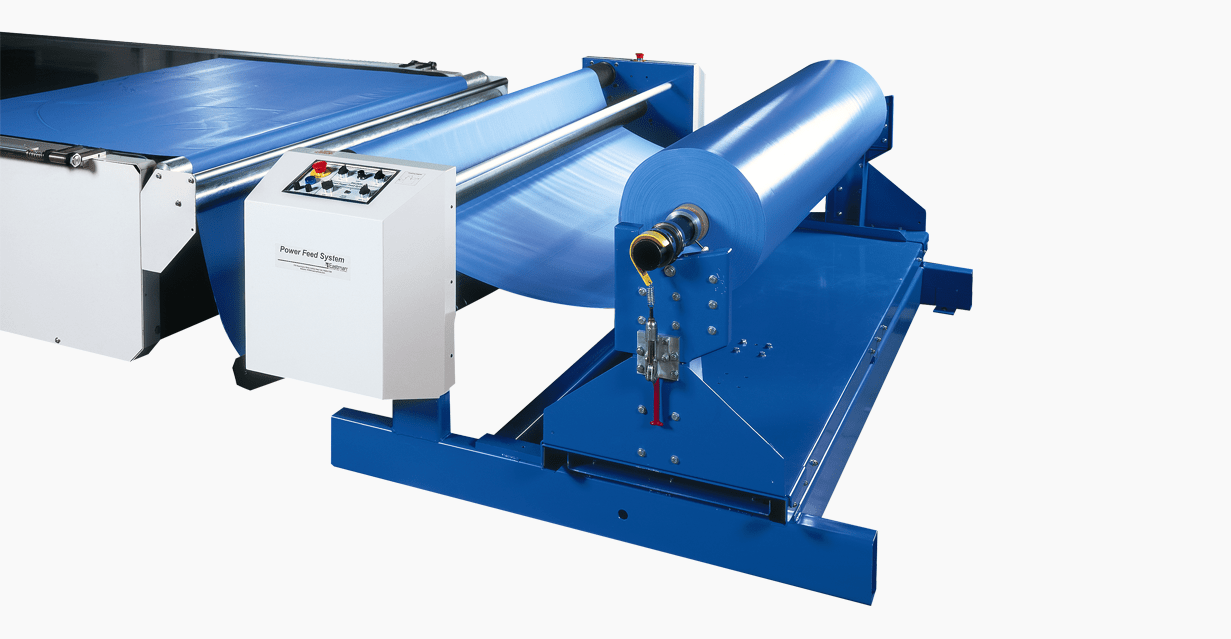EASTMAN Power Feed
The Power Feed System continuously supplies material to the cutting table with consistent tension.