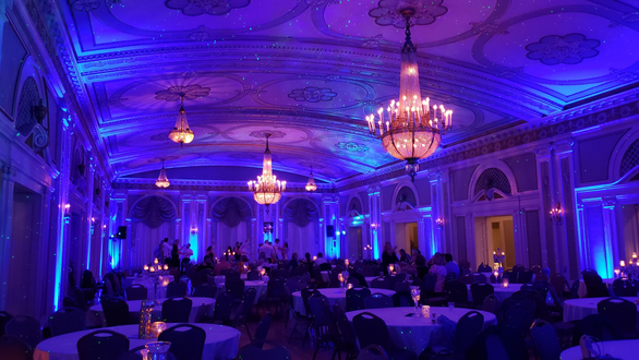 Greysolon Ballroom Wedding.
Up lighting in blue with stars and Northern Lights on ceiling.