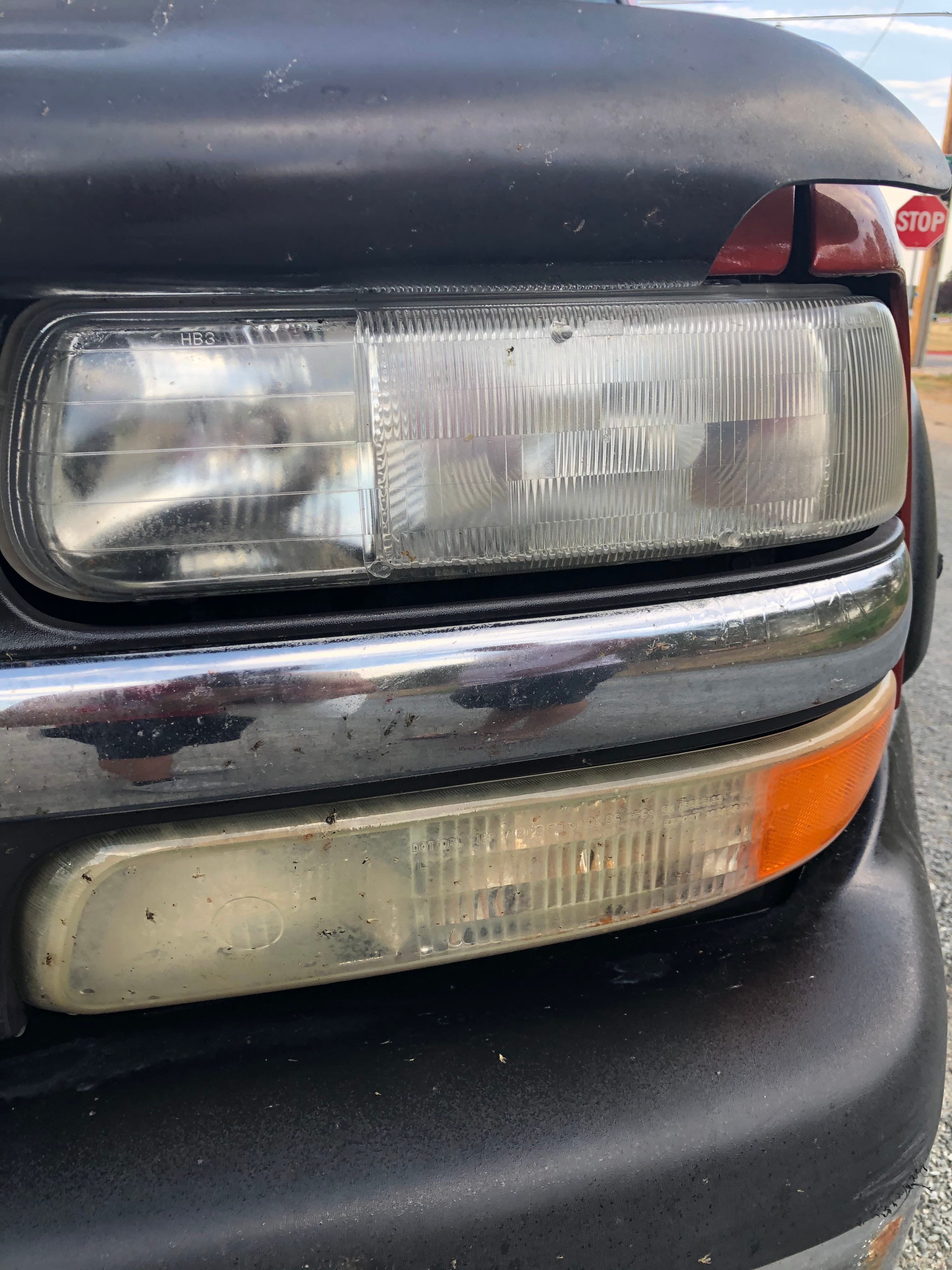 The top of this headlight has been restored and the bottom is how it looked before