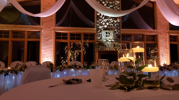 Northern Pines Golf Center in Iron River, WI. Wedding lighting in a dim warm white and a soft peach by Duluth Event Lighting.